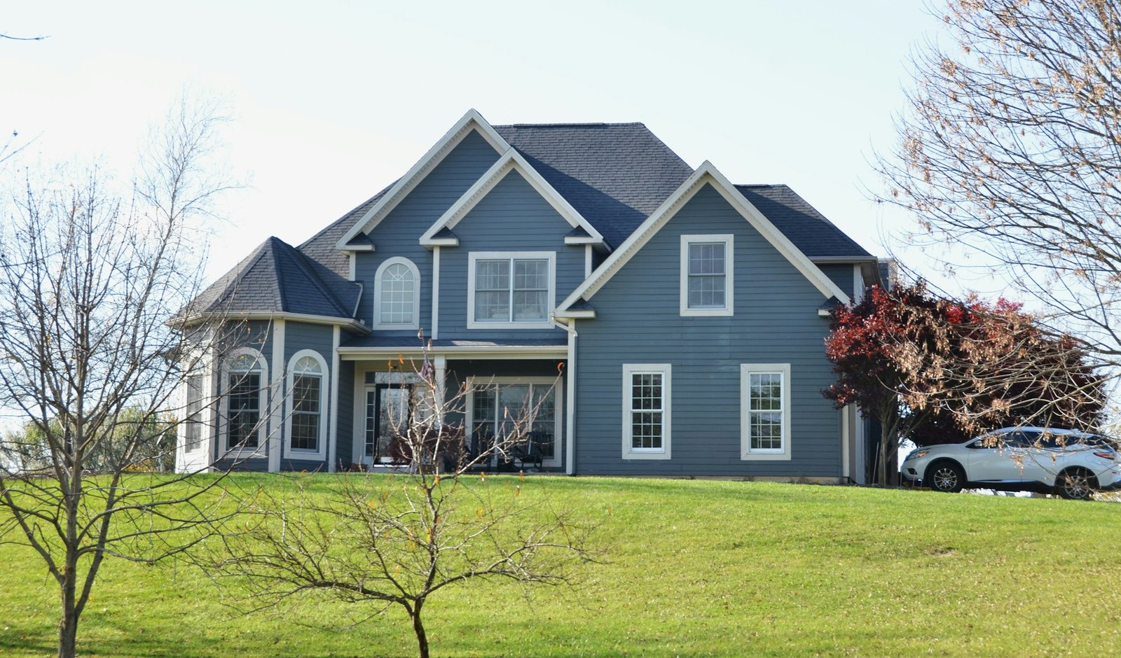 Blue house exterior with white trim